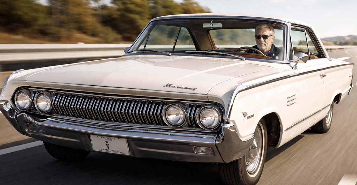 Man driving a Mercury Marauder