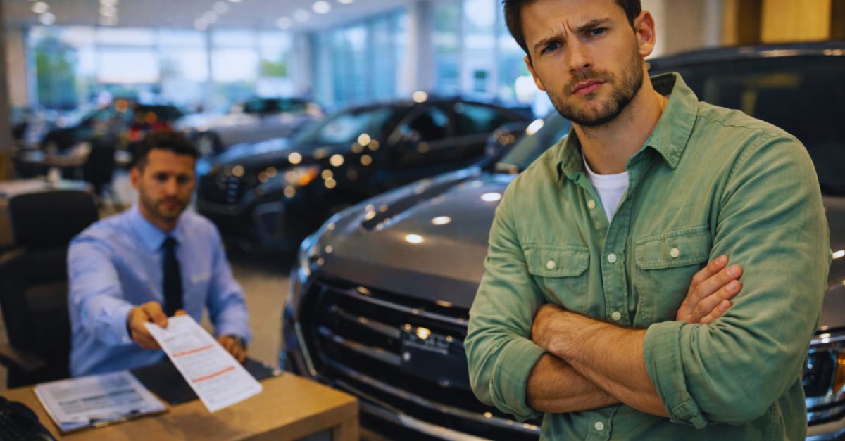 Man in a car dealership
