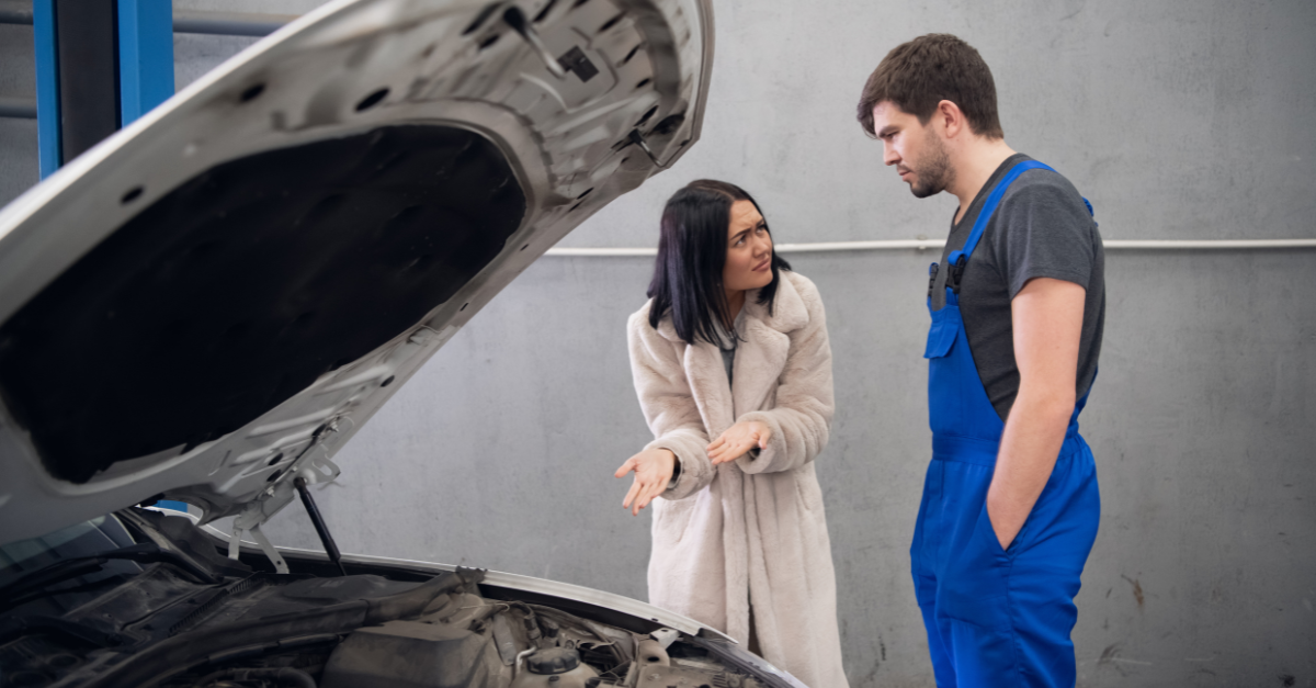 A client complains to a repairer about a bad car repair