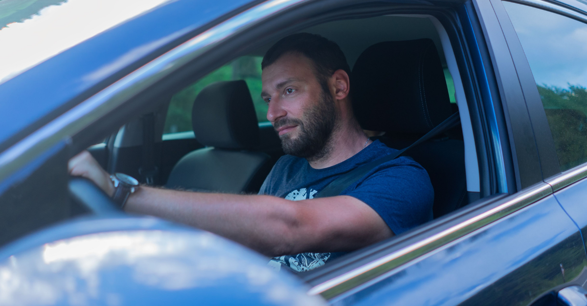 bearded-man-driving-a-car