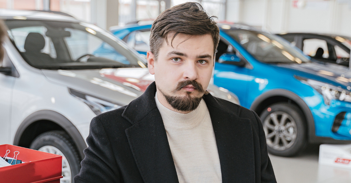 a-man-in-a-car-dealership