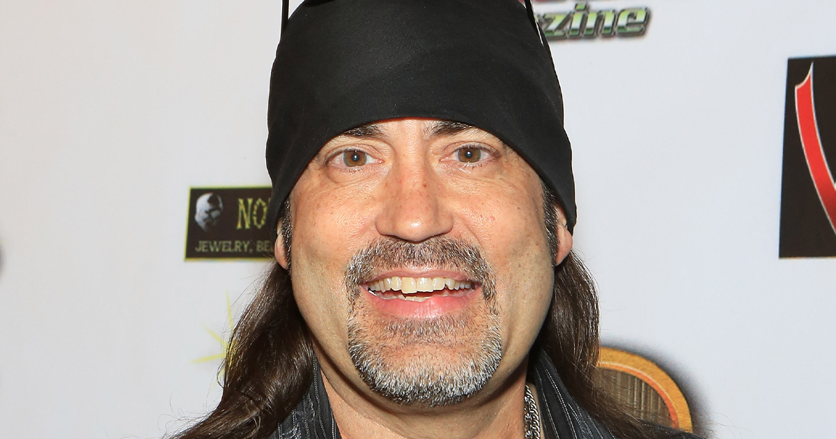 Danny Koker wearing a black head scarf