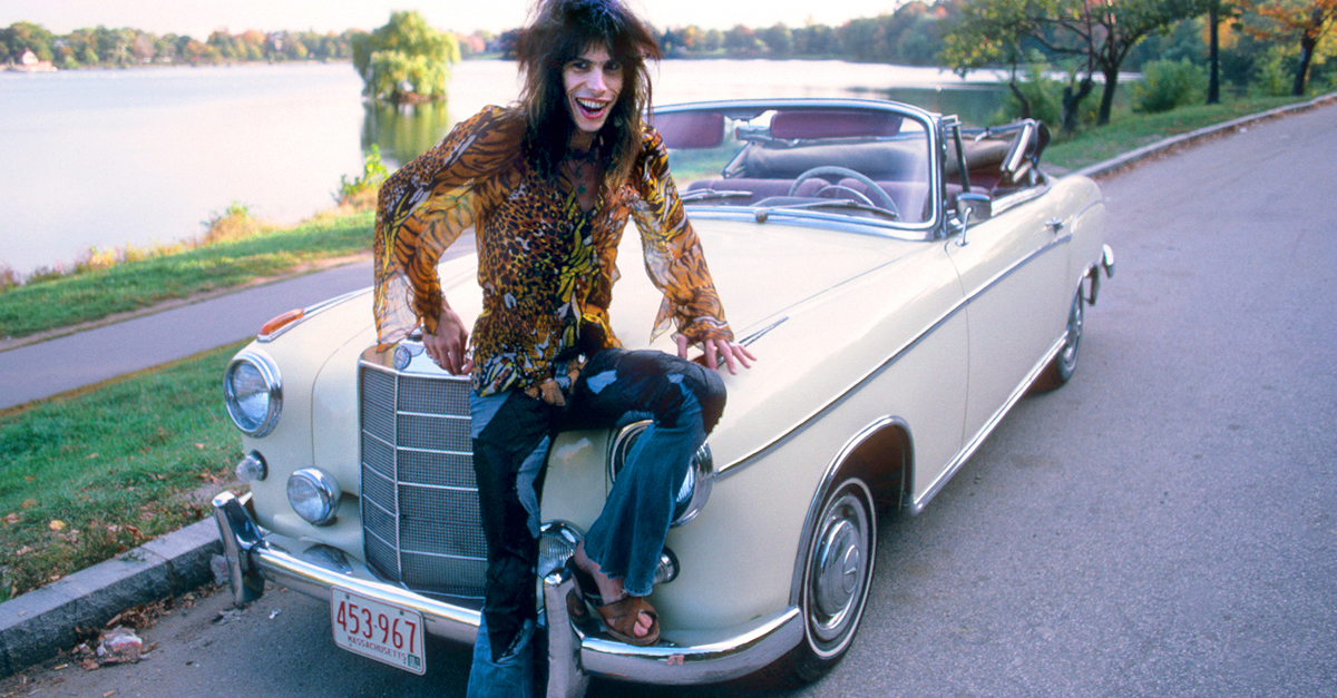 Steven Tyler of rock group Aerosmith in his 1956 Mercedes Benz 220S at Jamaica Pond, Boston MA October 9, 1975