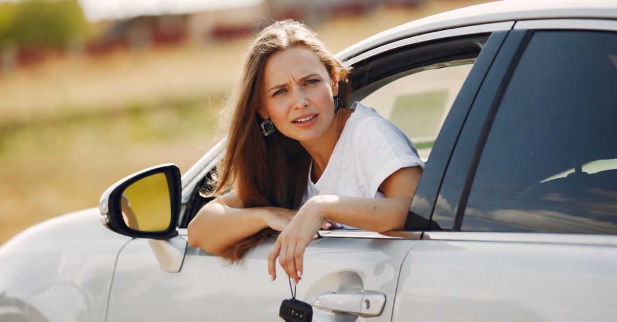 Confused Woman In A Car