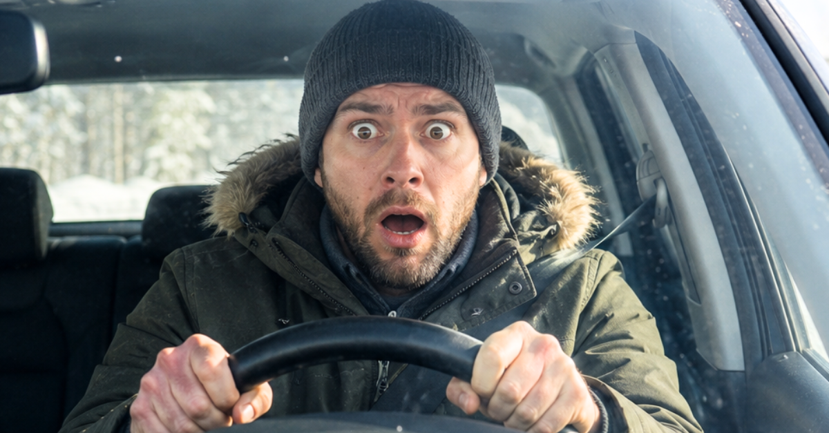 Shocked Driver on Snowy Road